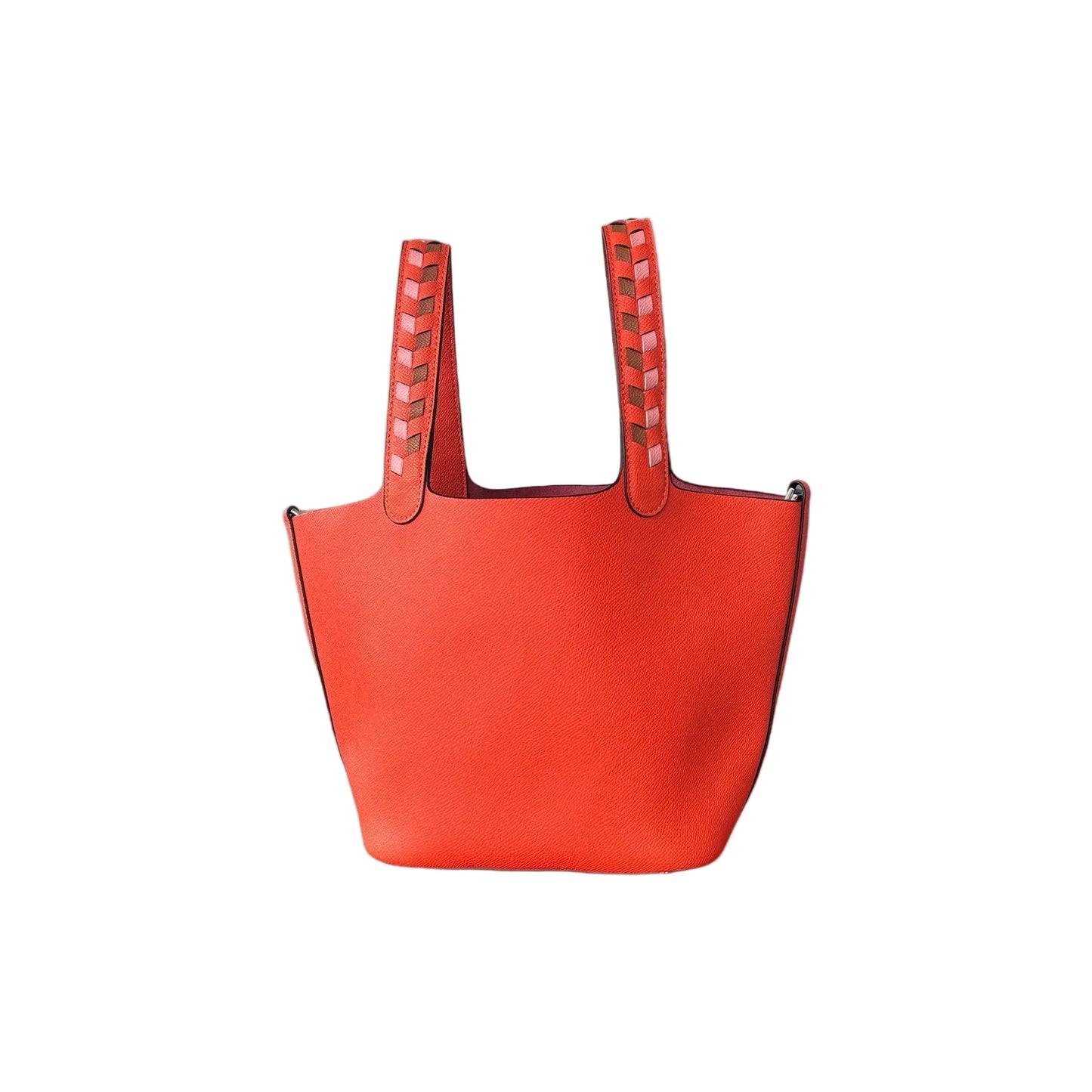 A red leather handbag with two handles and a zipper closure.