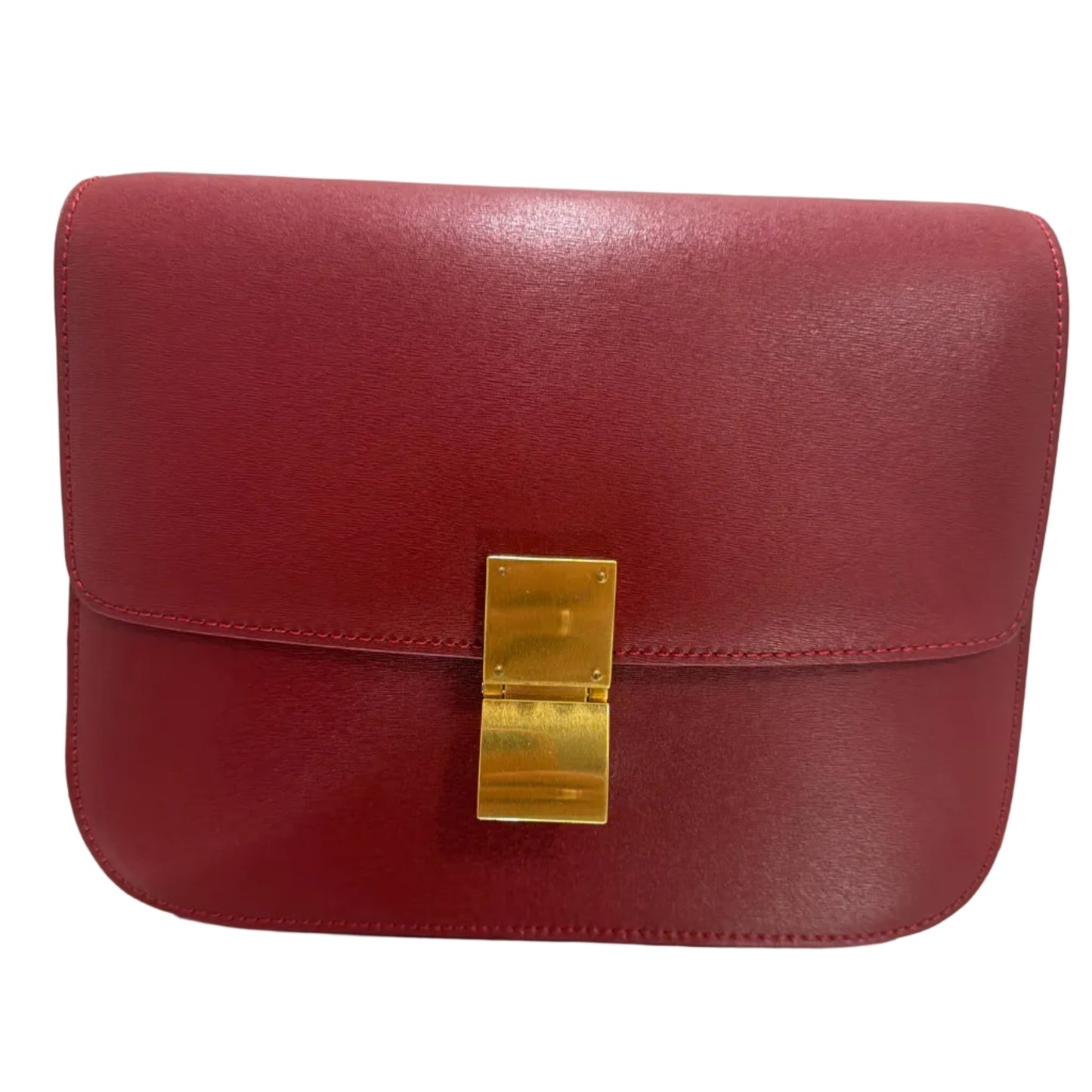 Red handbag with gold clasp on a light background