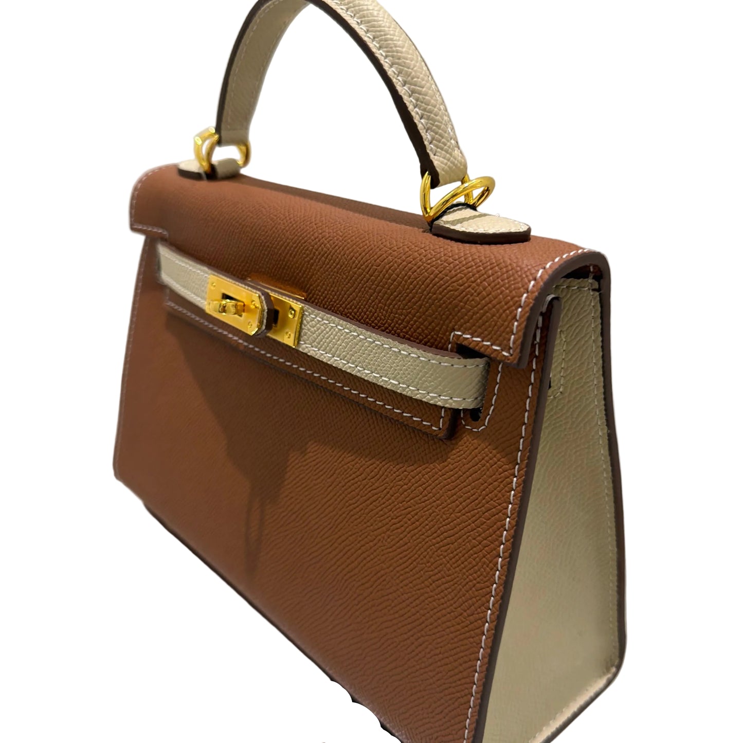 Brown handbag with gold accents on a white background