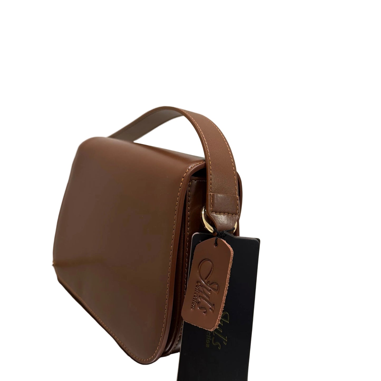 Brown leather bag with a visible brand logo on a light background