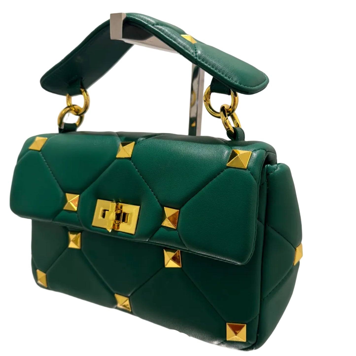 Green handbag with gold accents on a white background