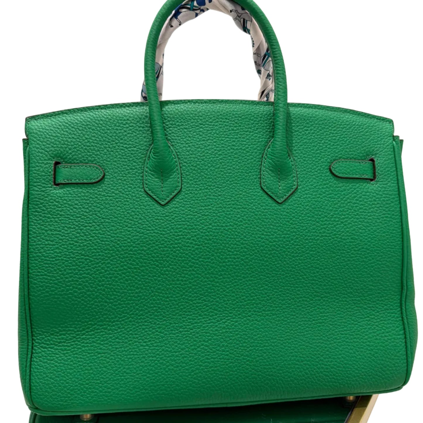 Green handbag on a white background