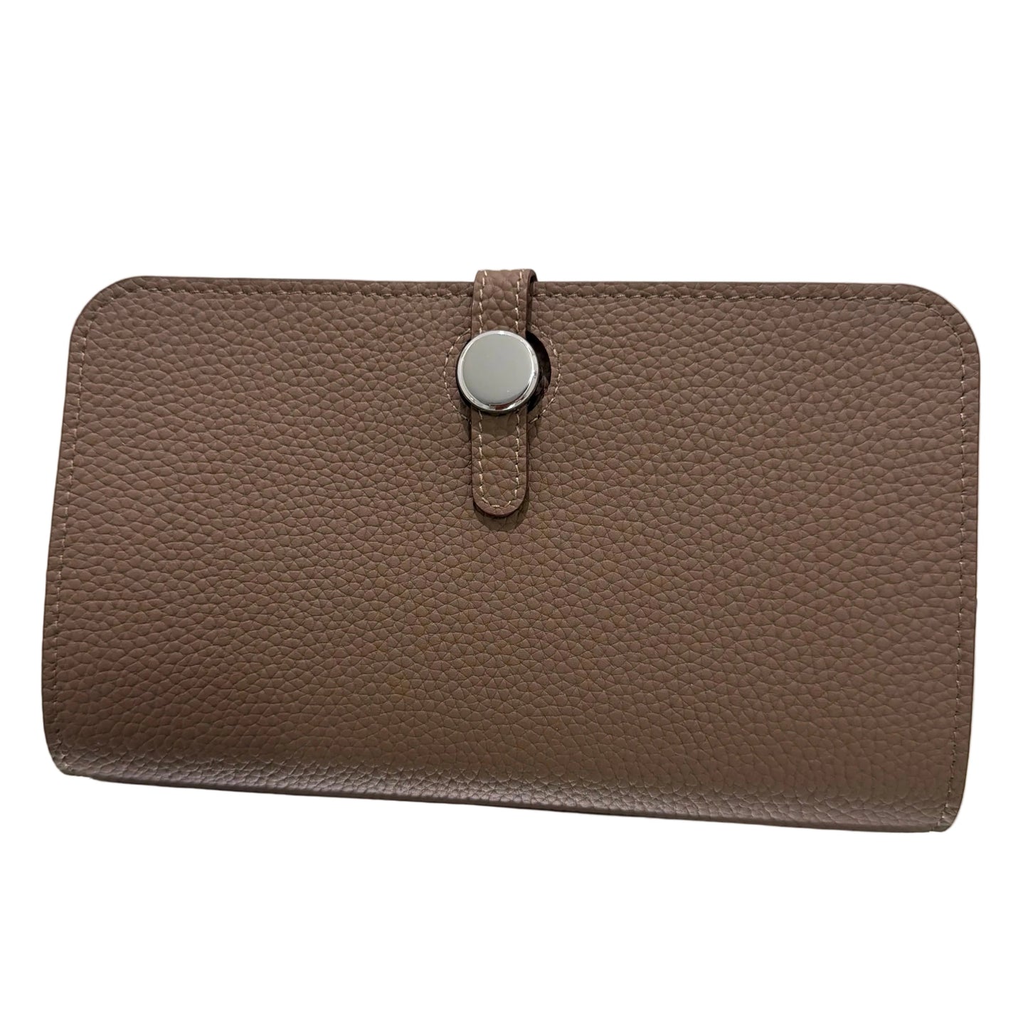 Brown textured handbag with a silver clasp on a light gray background