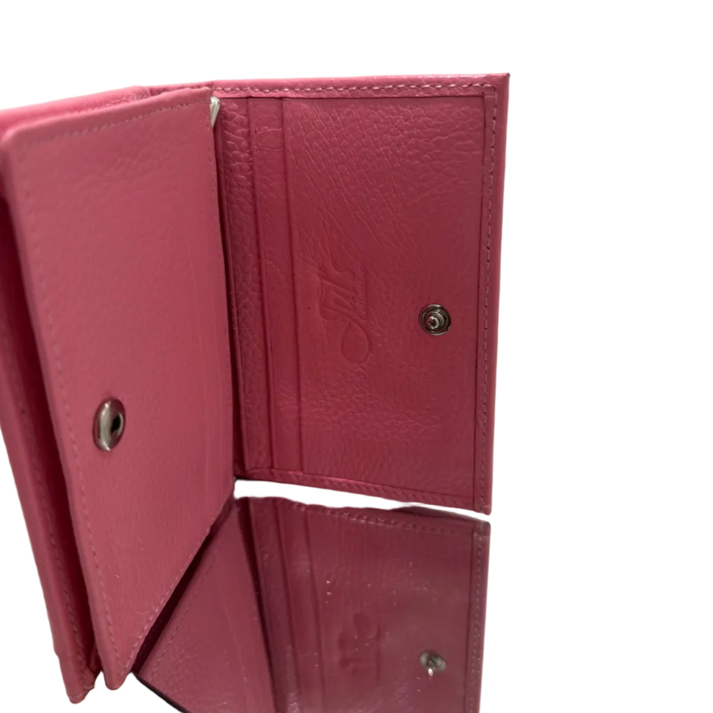 Pink wallet with metallic accents on a light background