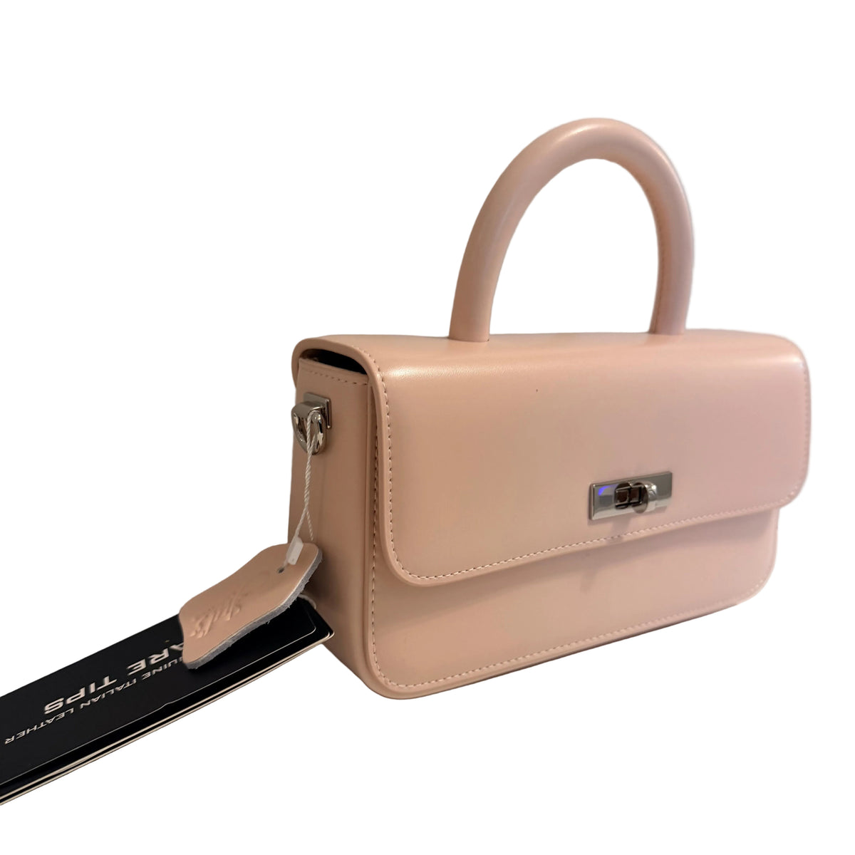 A light pink leather handbag with a top handle and silver-tone hardware, photographed on a plain light background.