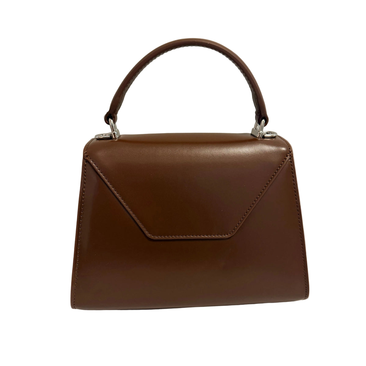 A brown leather handbag with a top handle, envelope-style flap, and silver-tone hardware, photographed against a plain light gray background.