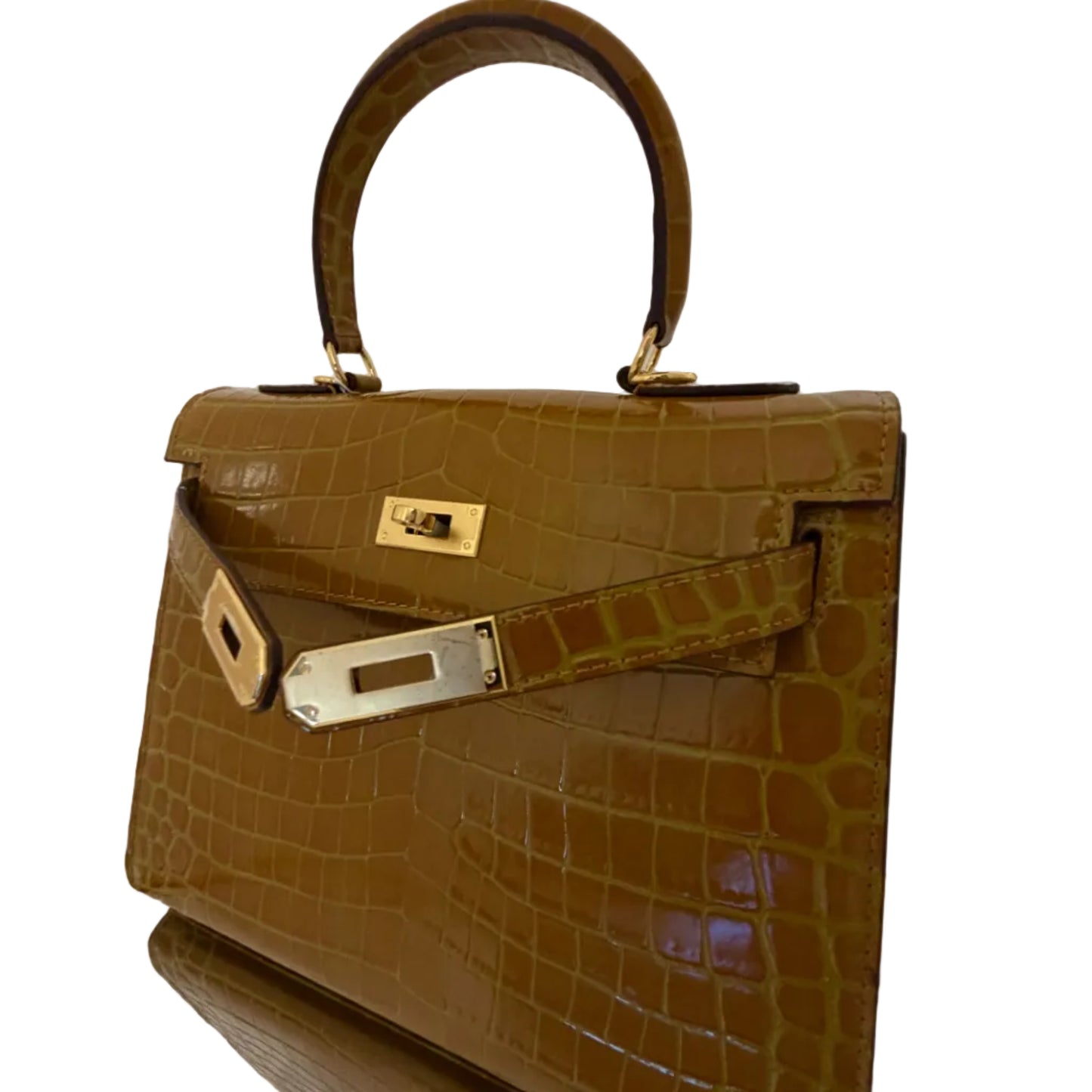 Brown crocodile-patterned handbag on a white background