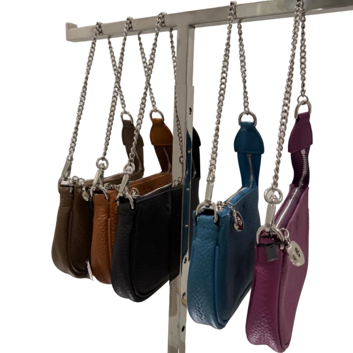 Collection of small handbags on a metal rack with a white background