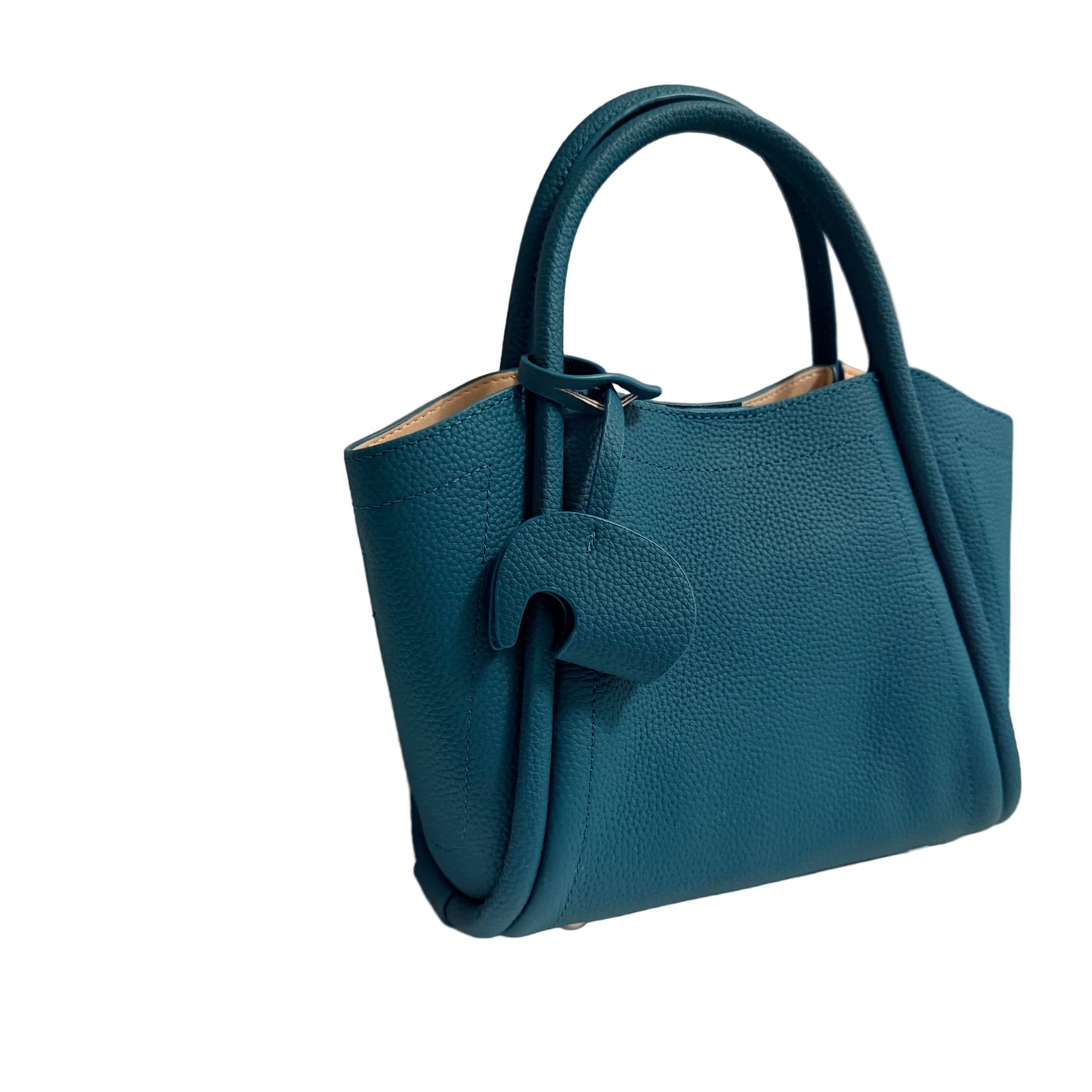 Blue handbag on a beige background