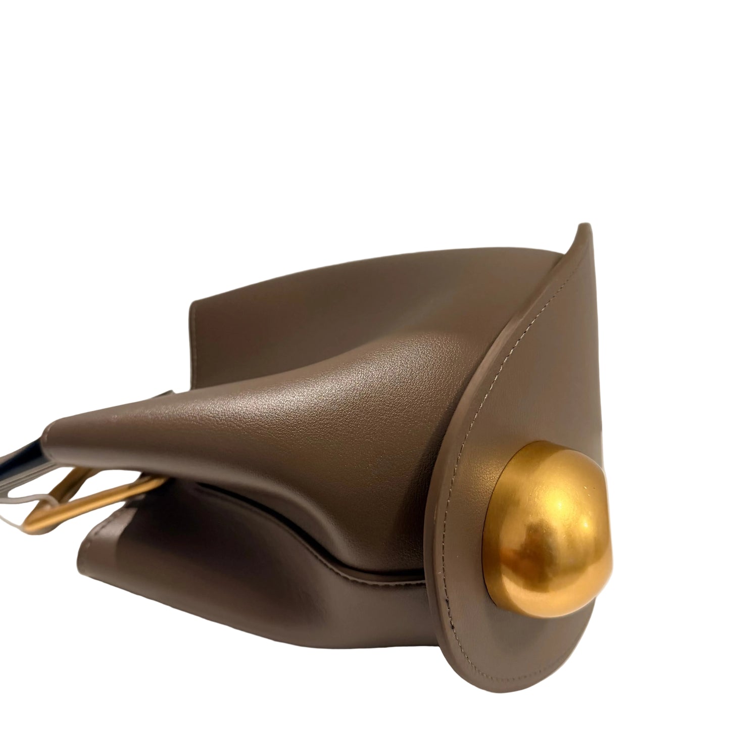 Brown leather handbag with a gold clasp on a light surface.