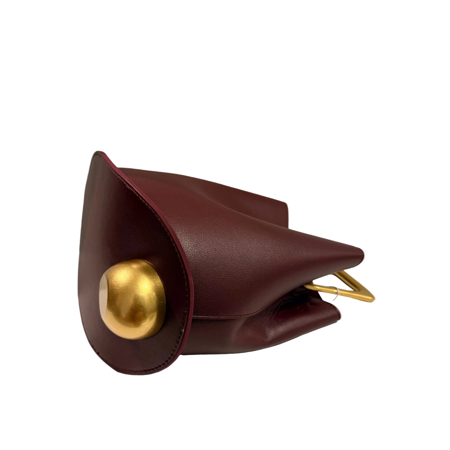 Brown leather clutch with gold clasp on a white surface