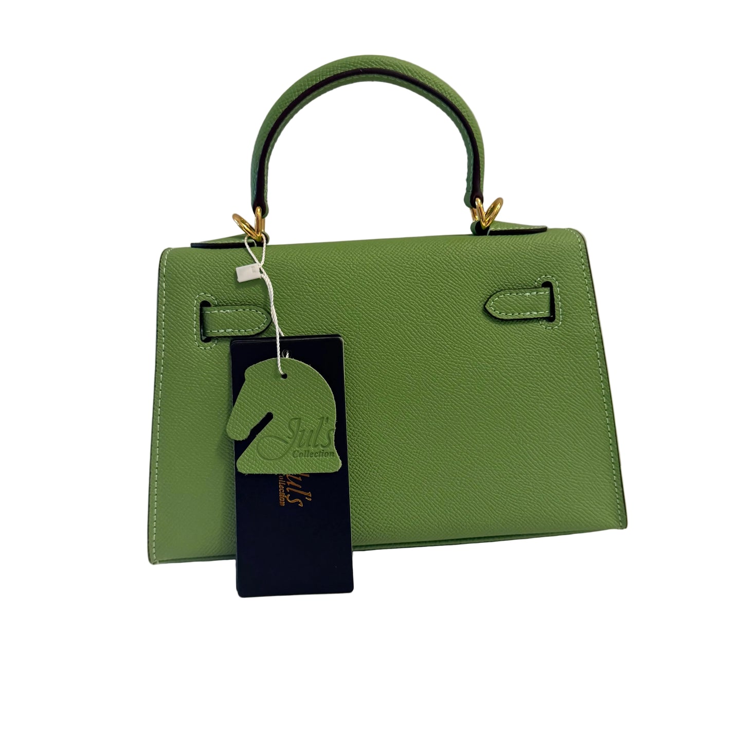 Green handbag with a tag on a neutral background