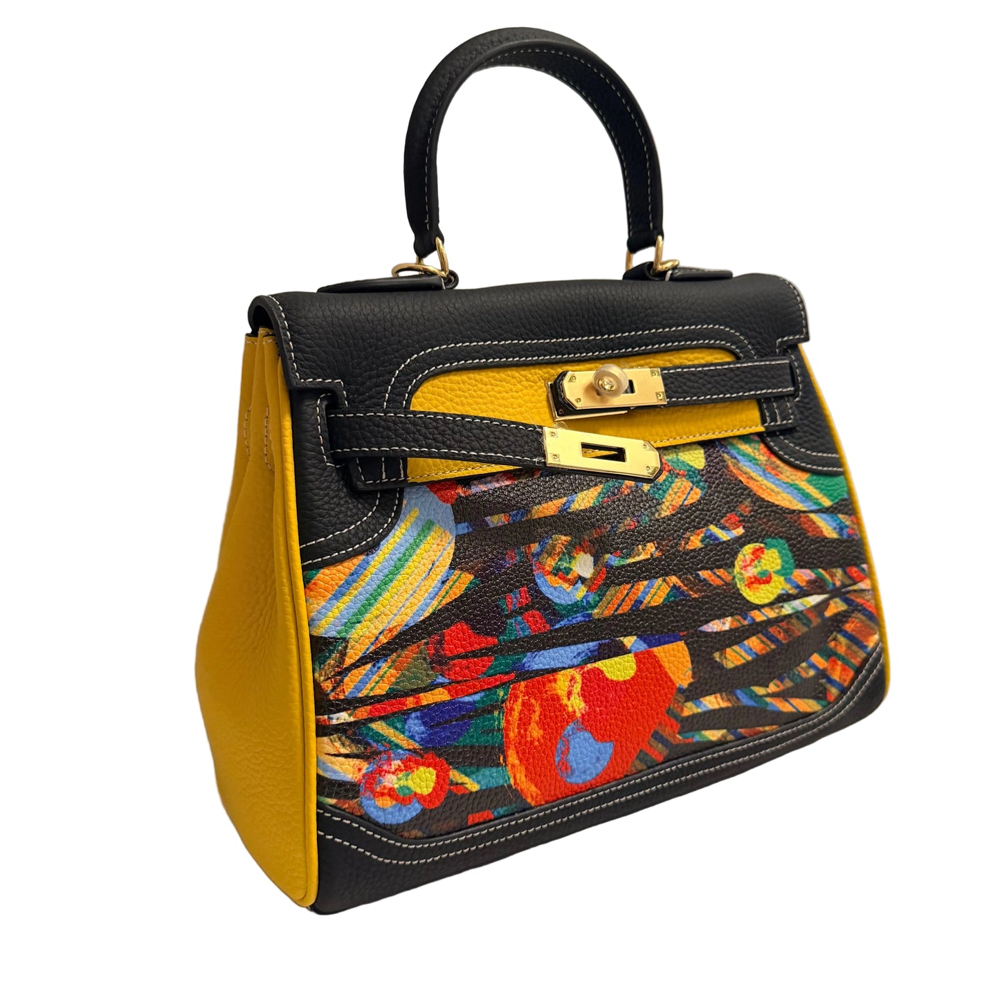 Colorful handbag with black base and yellow accents on a neutral background