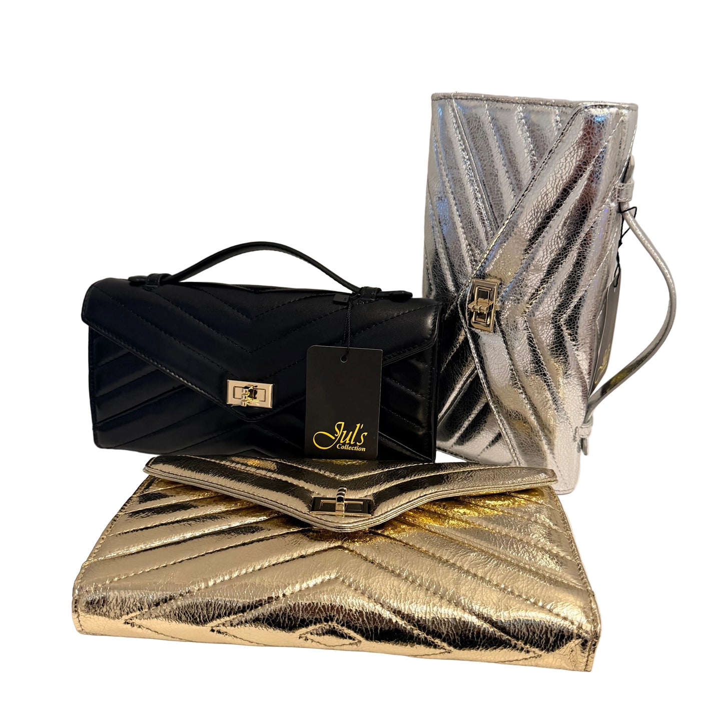 Three quilted clutch handbags in black, metallic silver, and metallic gold, arranged together on a white surface against a light gray wall. Each bag features a diagonal chevron pattern, a flap closure with a gold-tone clasp, and a hangtag.