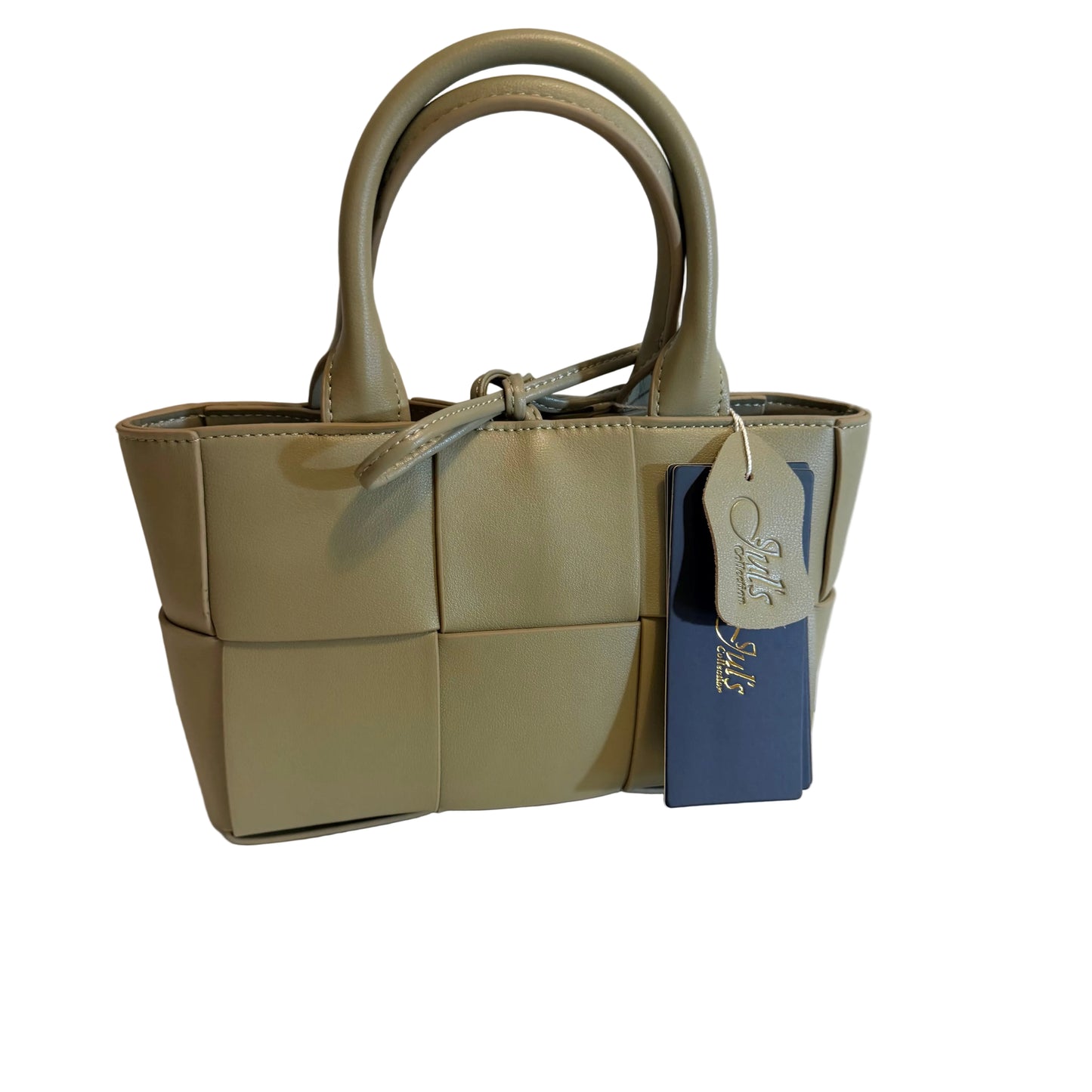 A small structured handbag in a muted sage green color, featuring a woven leather texture, double top handles, and a blue and white brand tag hanging from the side.