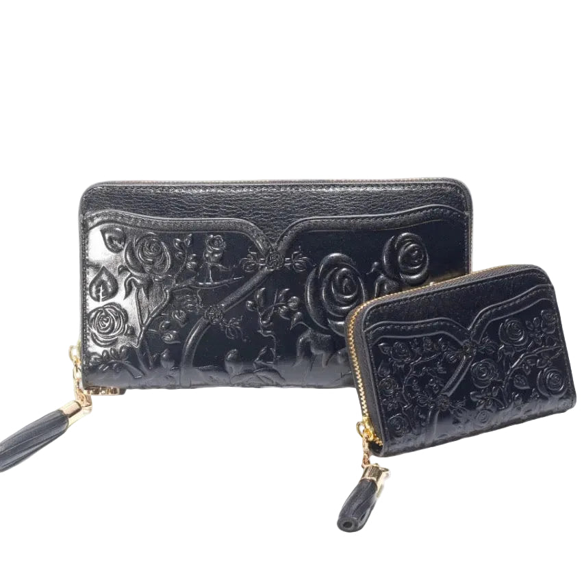 Two black embossed wallets on a white background