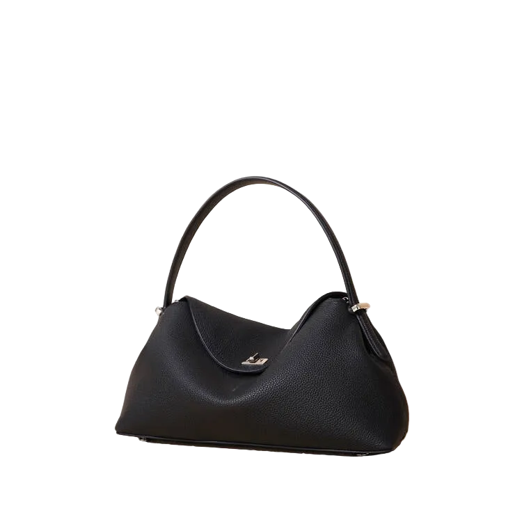 Black handbag on a beige background