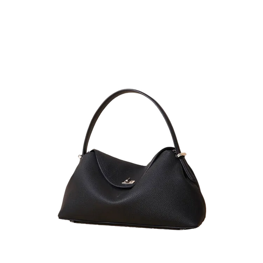 Black handbag on a beige background