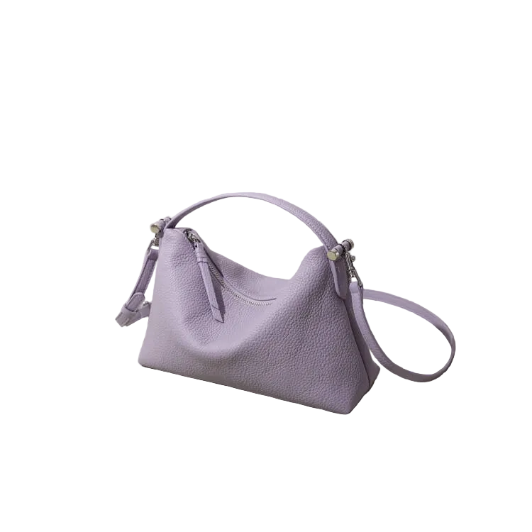 Lavender handbag on a light gray background