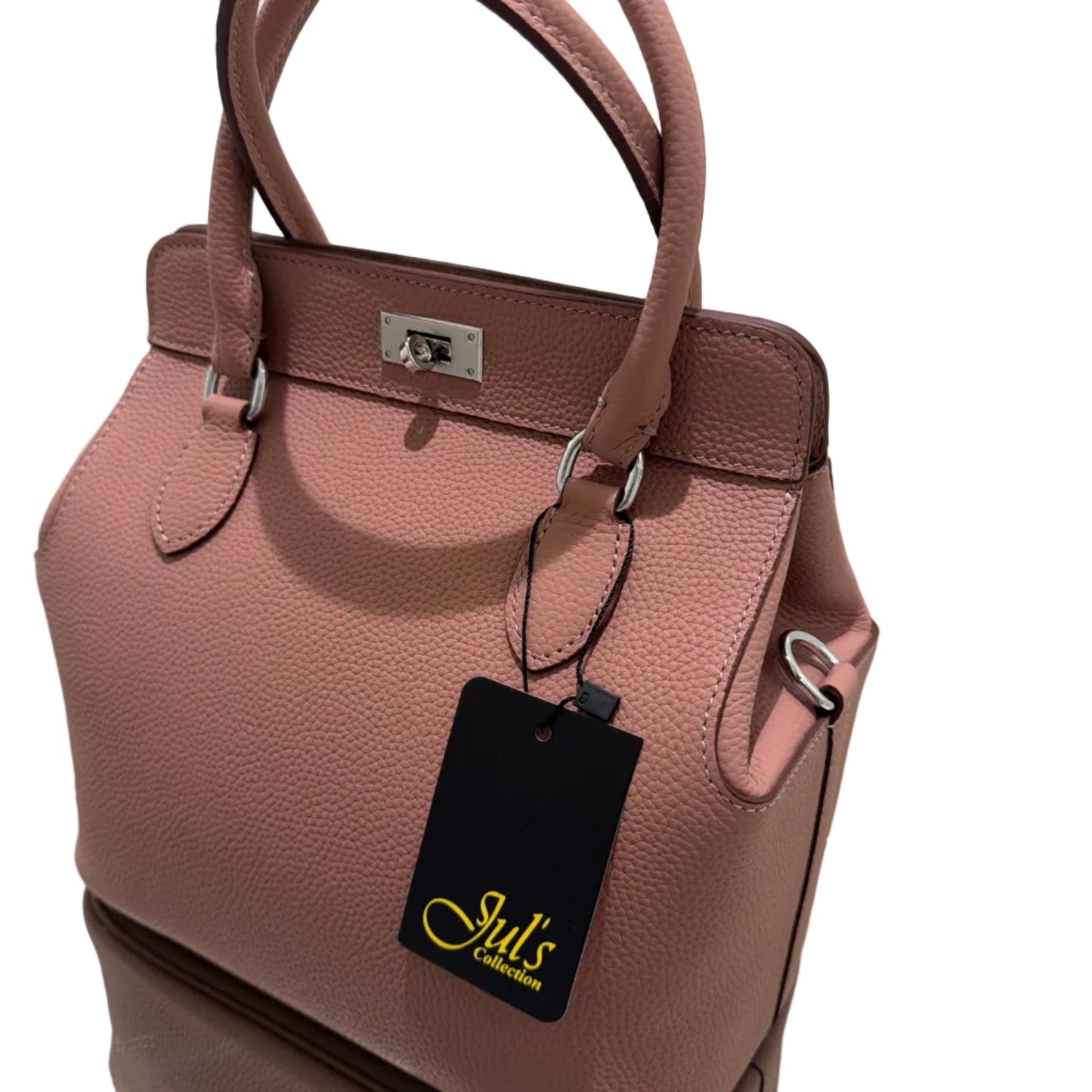 Pink handbag with a visible brand tag on a light background