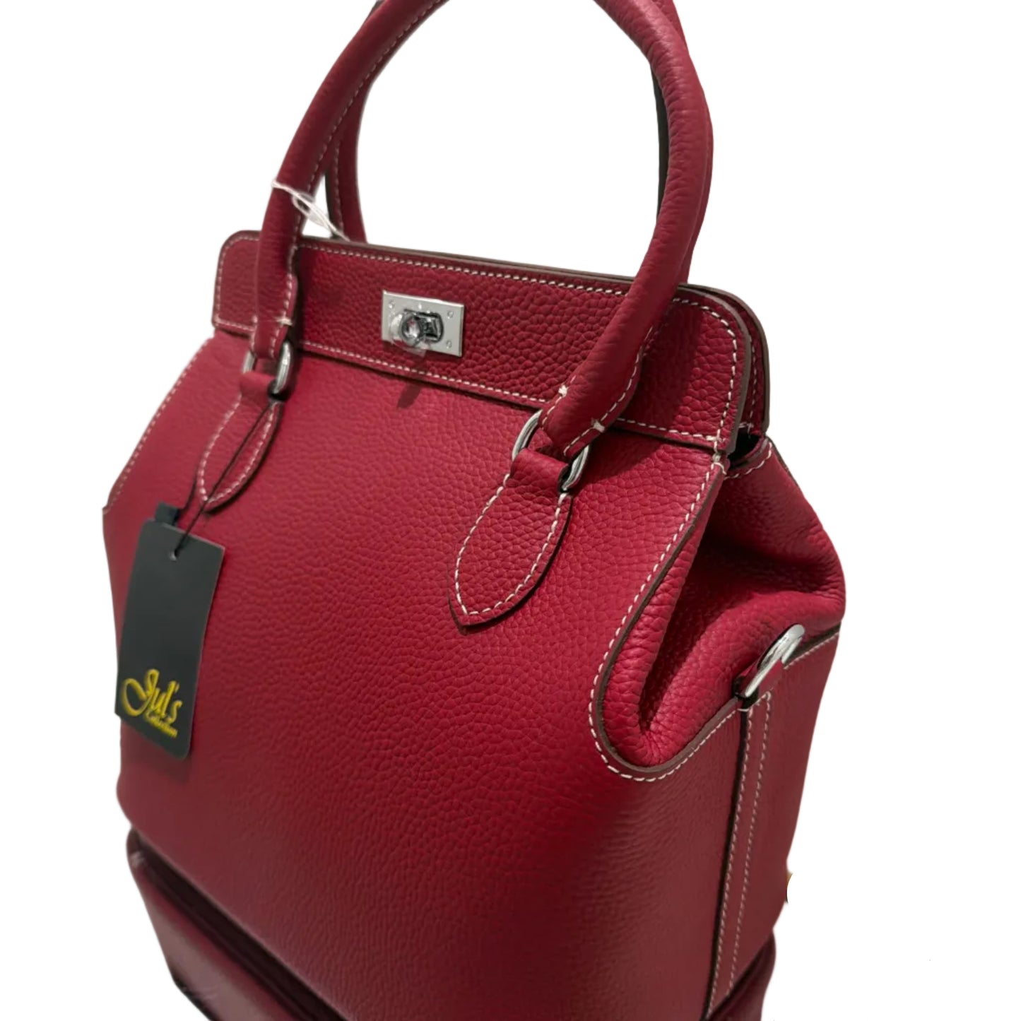 Red handbag with a visible brand tag on a white background