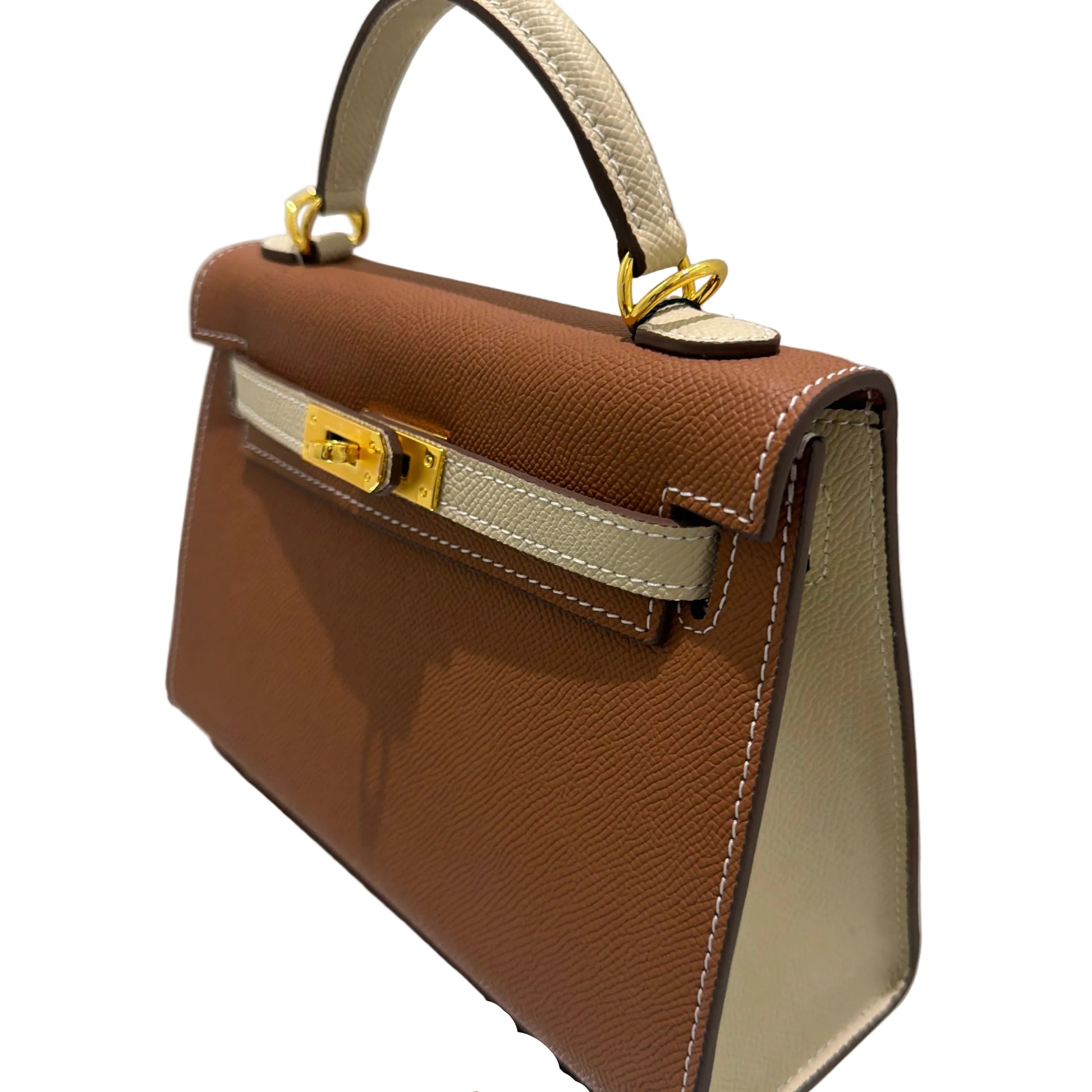 Brown handbag with gold accents on a white background