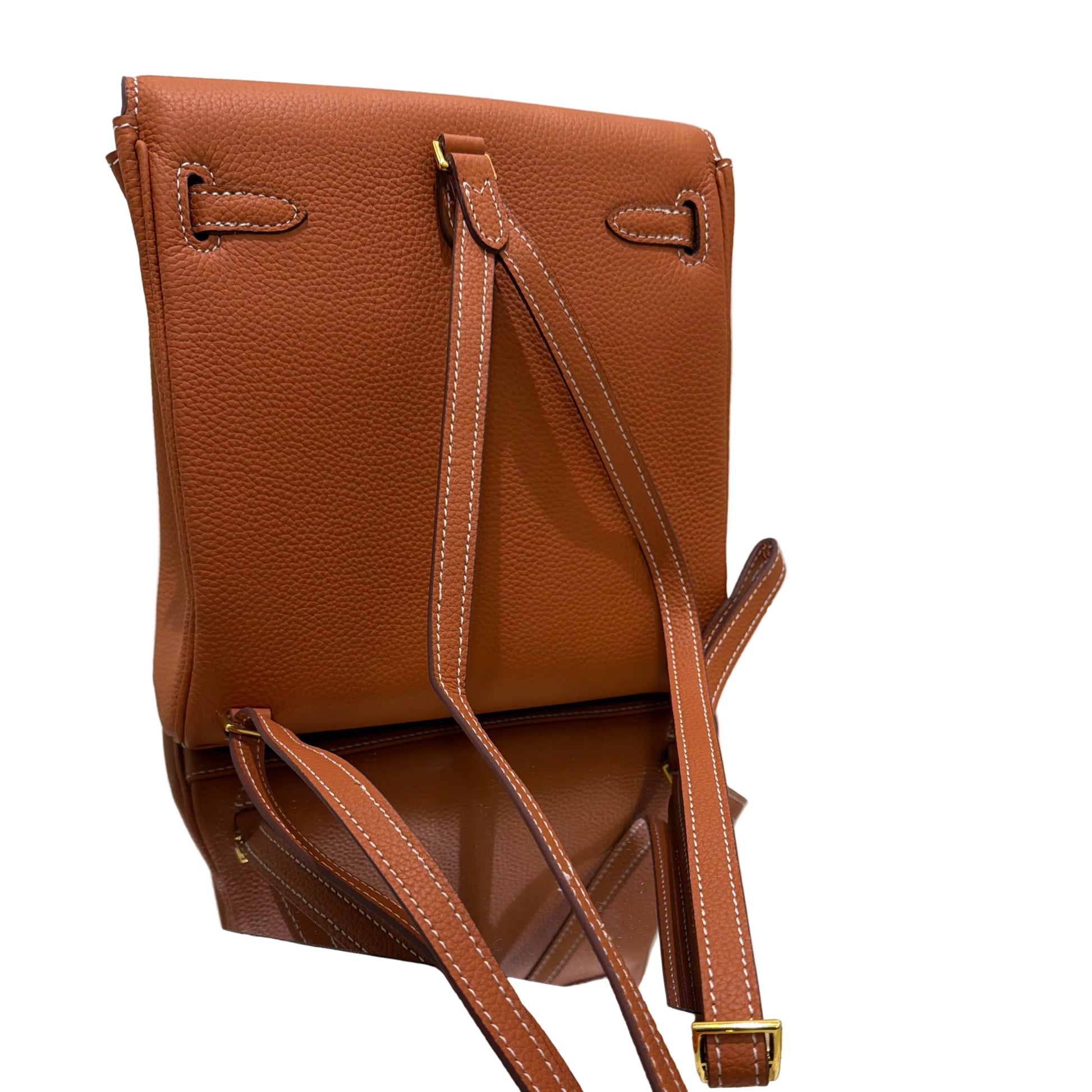 Brown leather handbag with gold accents on a white background