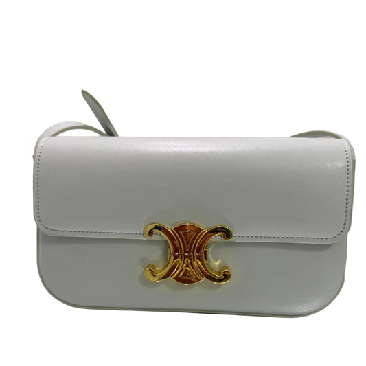 Two light gray handbags with gold accents on a white background