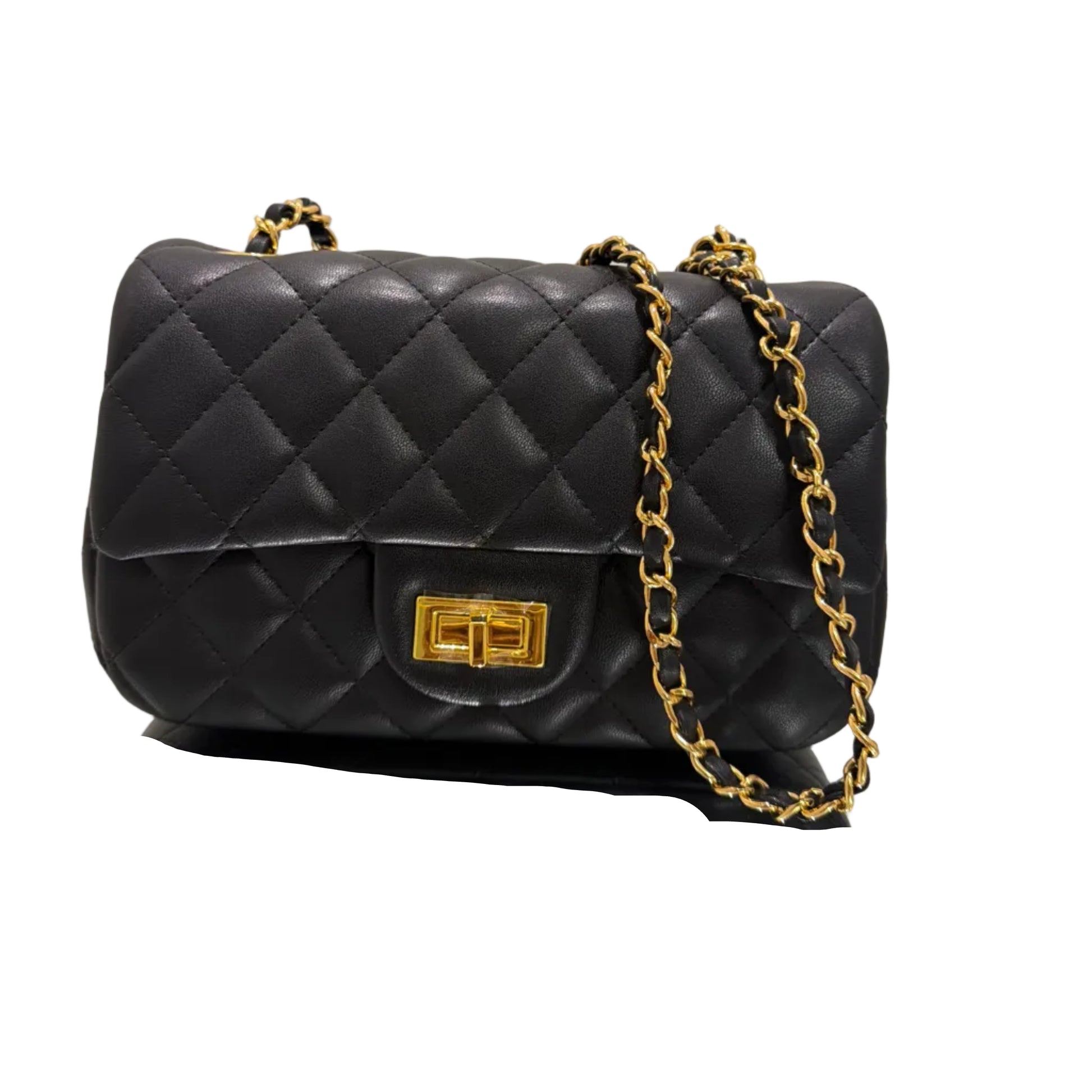 Black quilted handbag with gold chain and clasp on a beige background