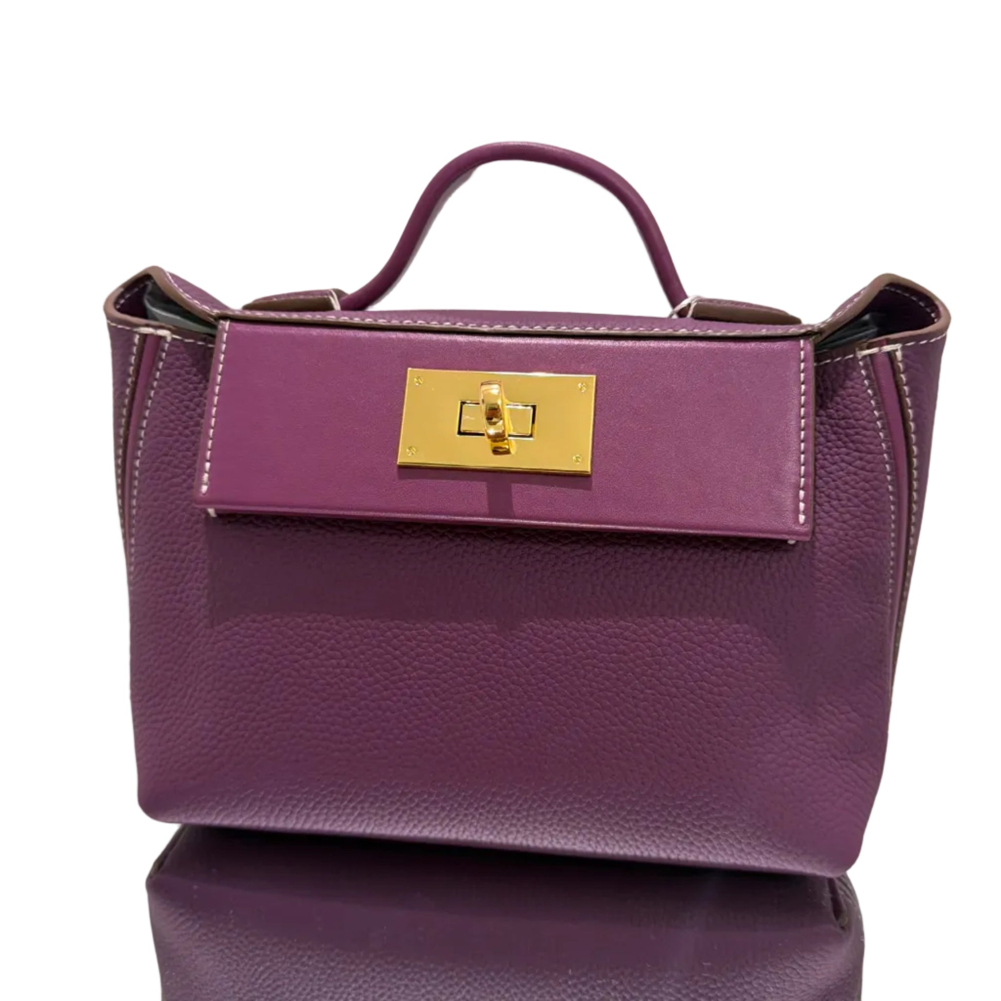 Purple handbag with a gold clasp on a light background