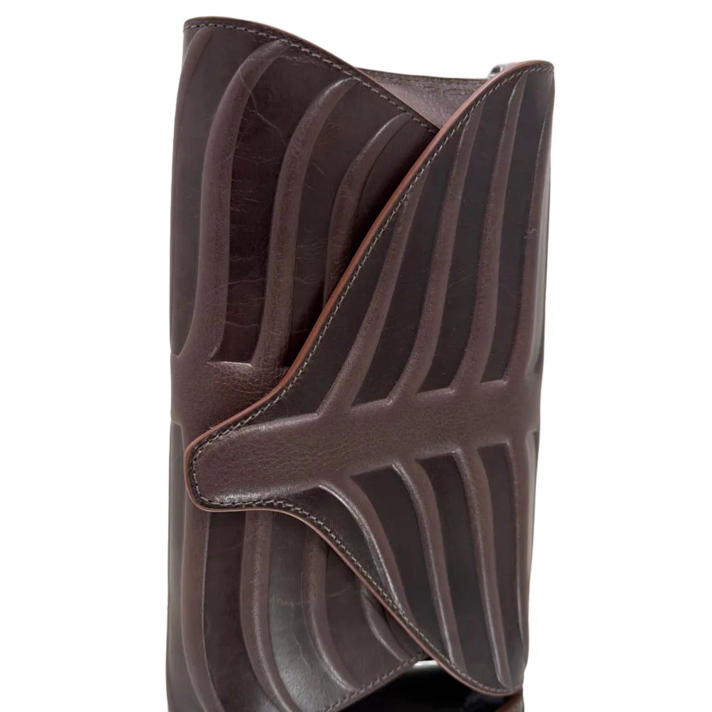 Brown clutch bag with a decorative flap on a light background