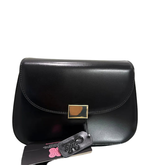 Black leather handbag with gold clasp on a light gray background
