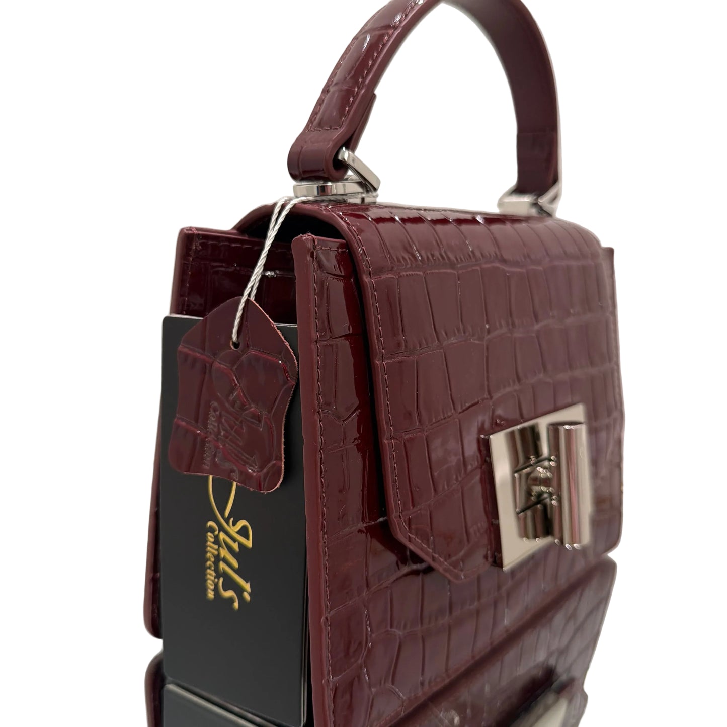 Maroon handbag with gold accents on a white background