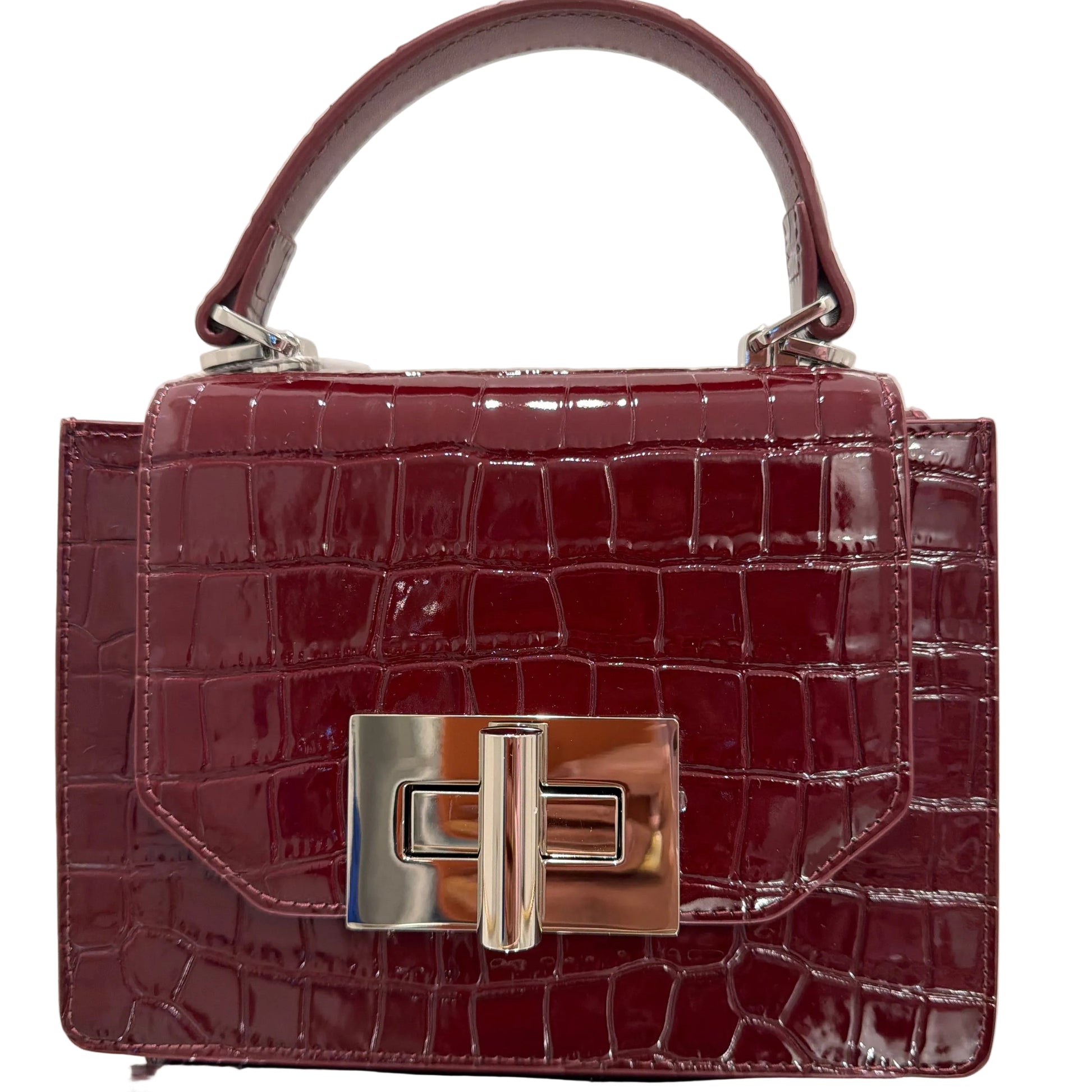 Maroon crocodile-patterned handbag with a silver clasp on a light background