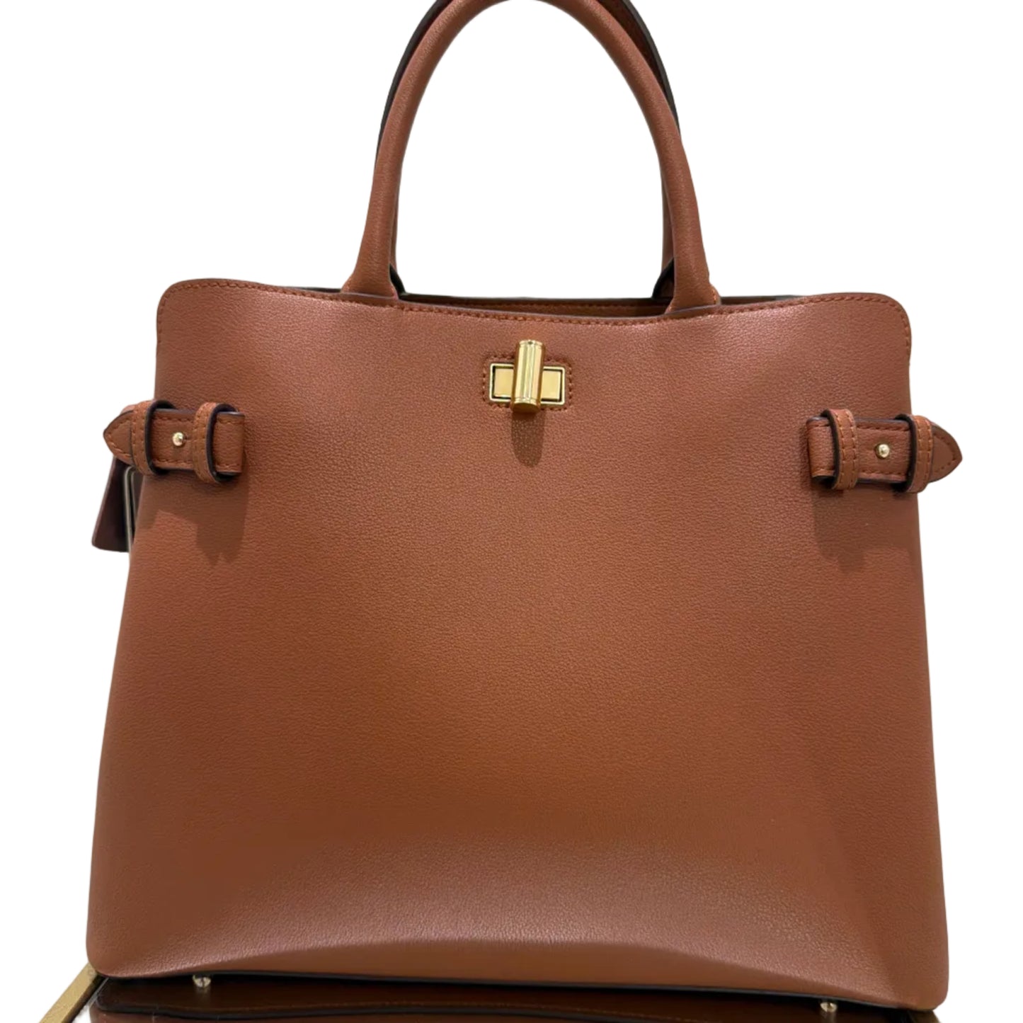 Brown leather handbag with gold clasp on a light gray background