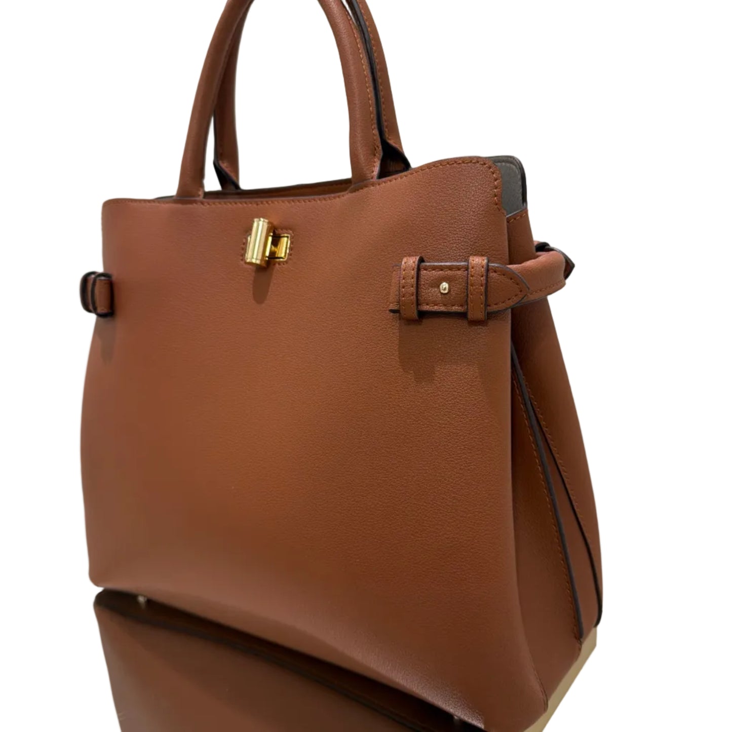 Brown leather handbag on a white background
