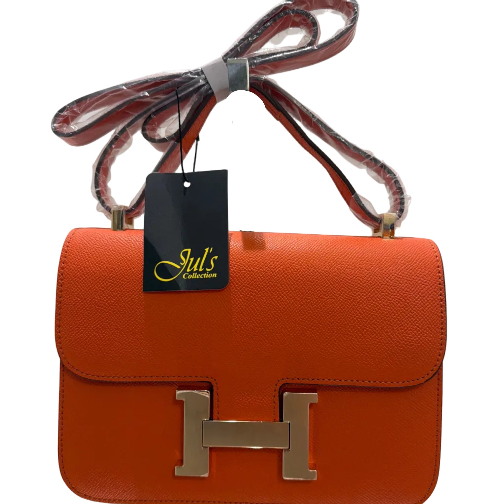 Orange handbag with gold 'H' logo and matching strap on a white background