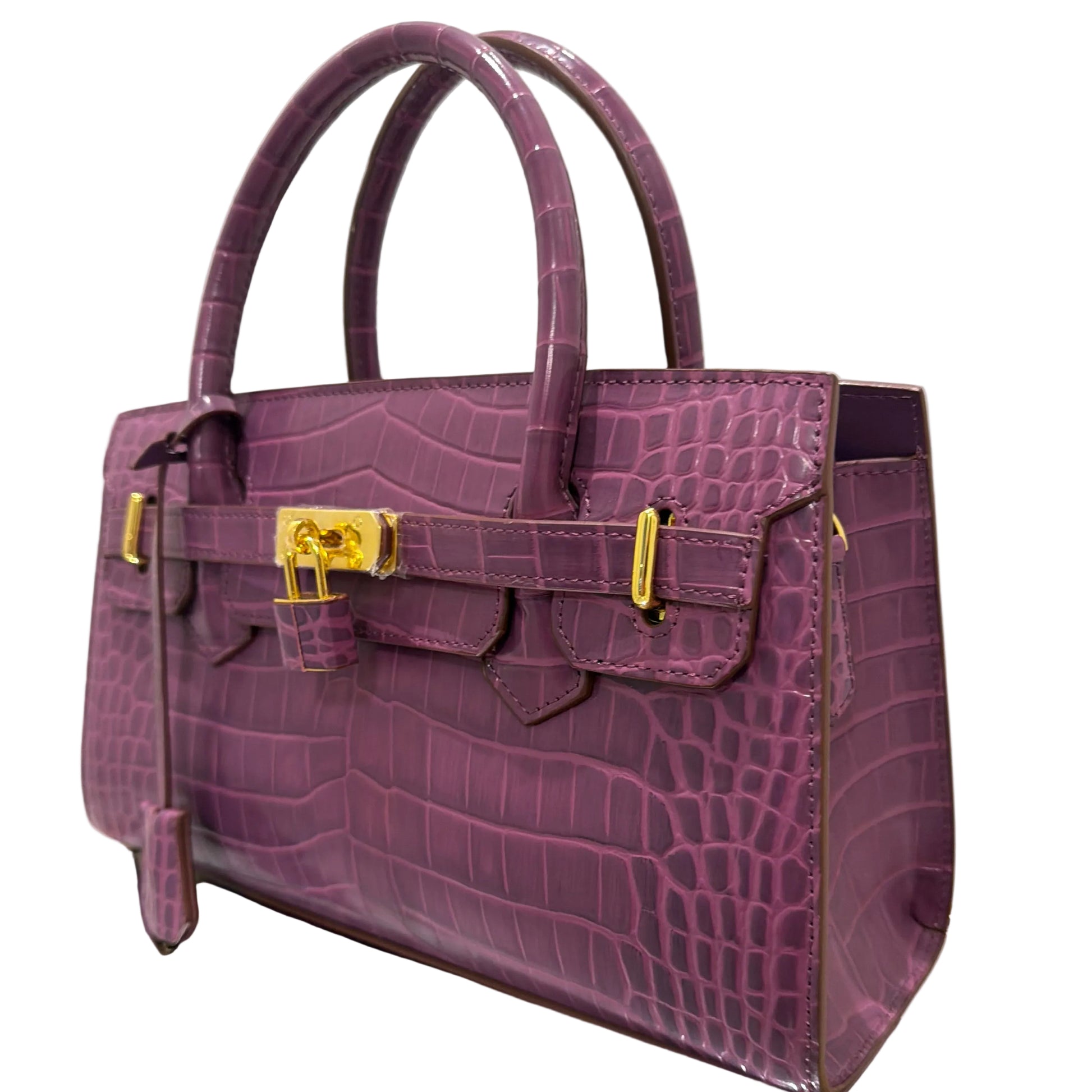 Purple textured handbag with gold accents on a white background