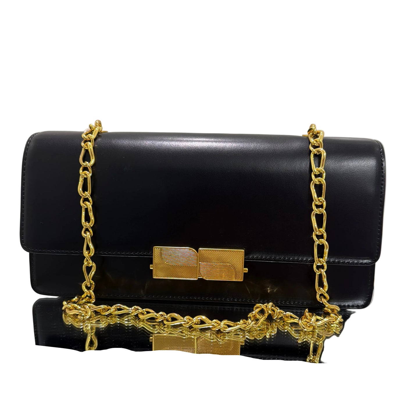 Black clutch bag with gold chain and lock on a light gray background