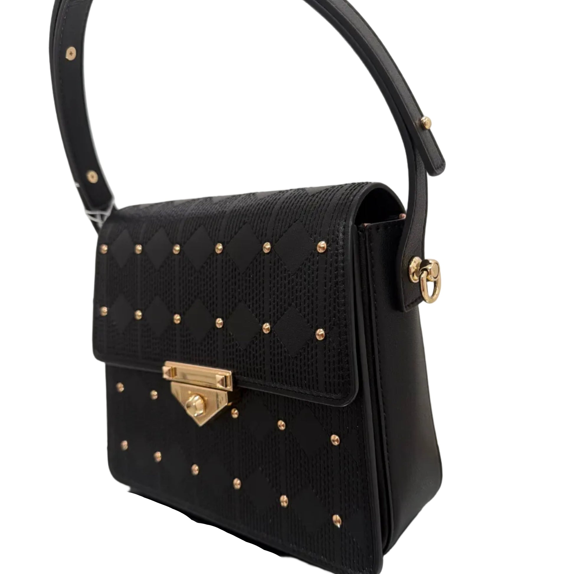 Black handbag with gold studs and accents on a reflective surface