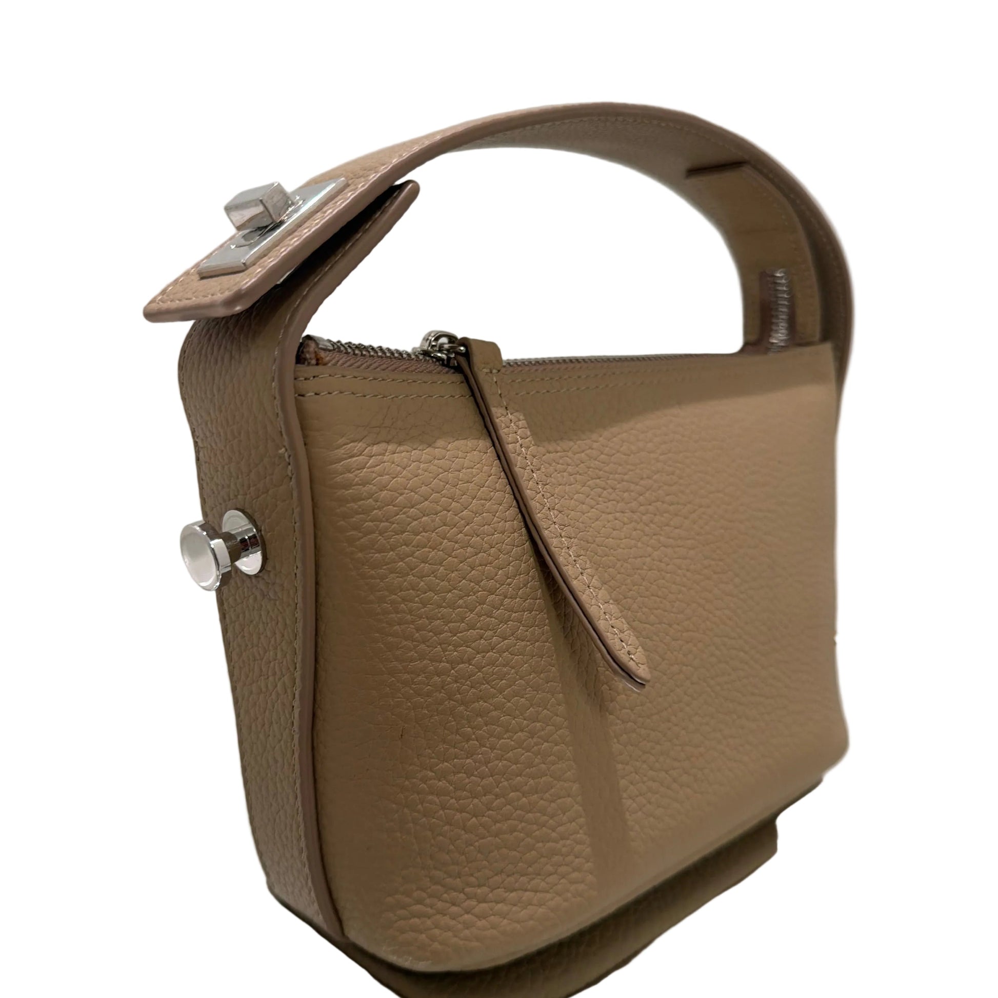Brown leather bag with a strap on a light gray background