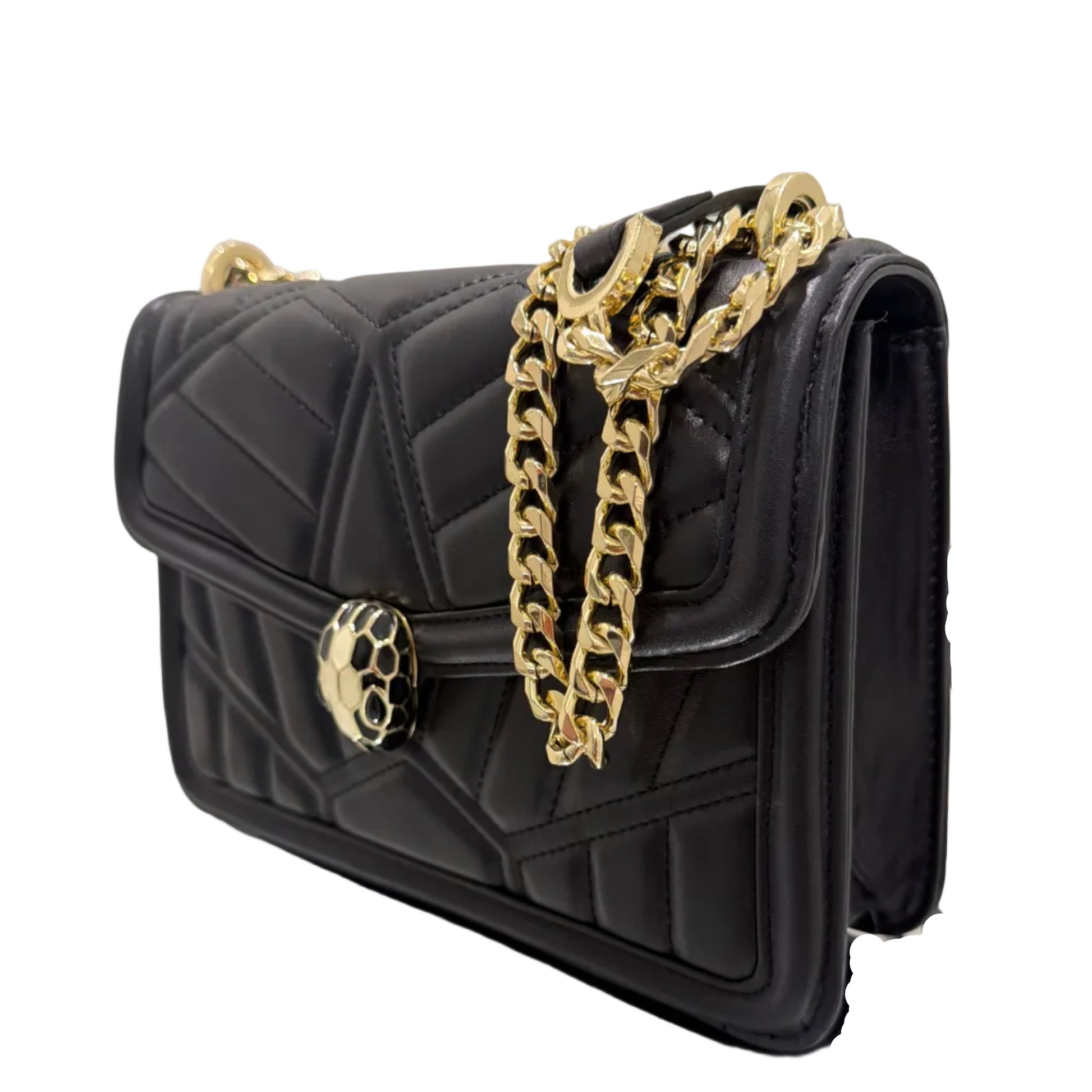 Black quilted handbag with gold chain and clasp on a light gray background