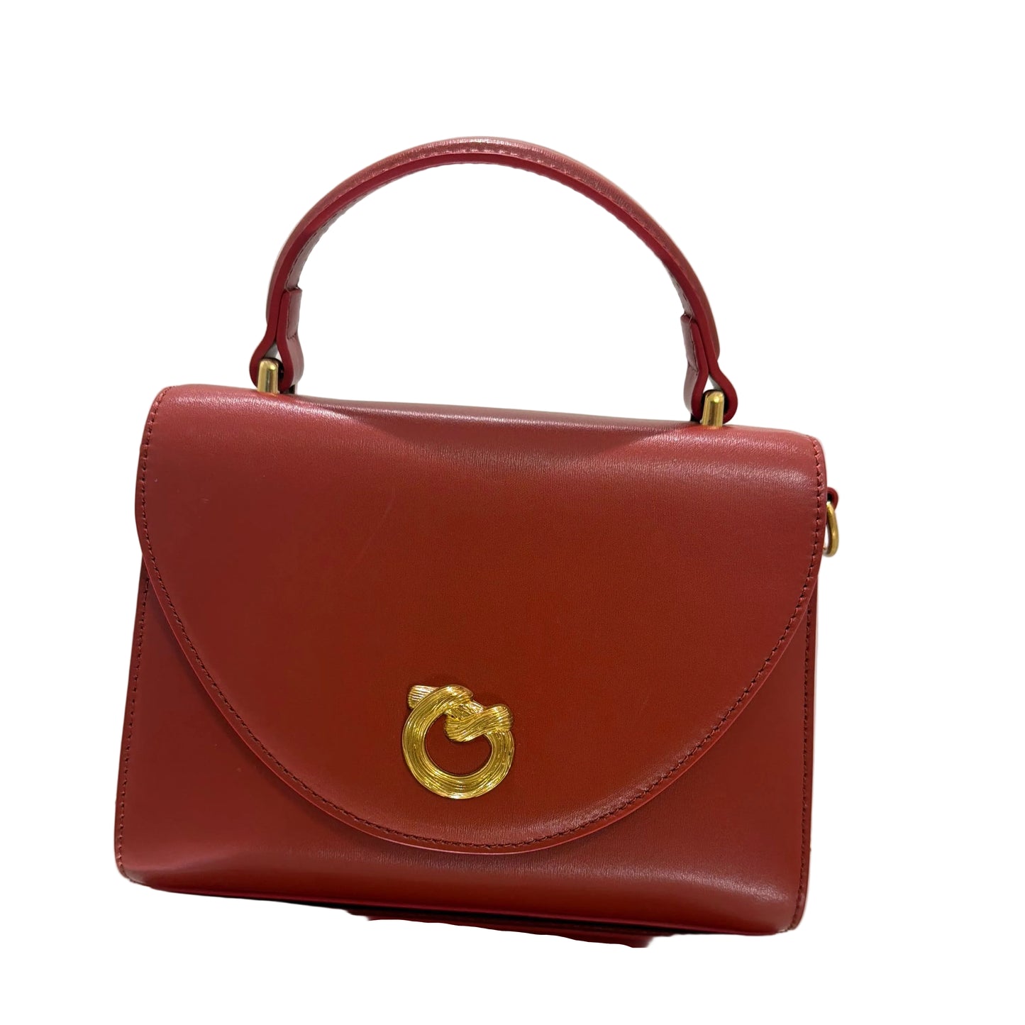 Two red handbags with gold accents on a light background