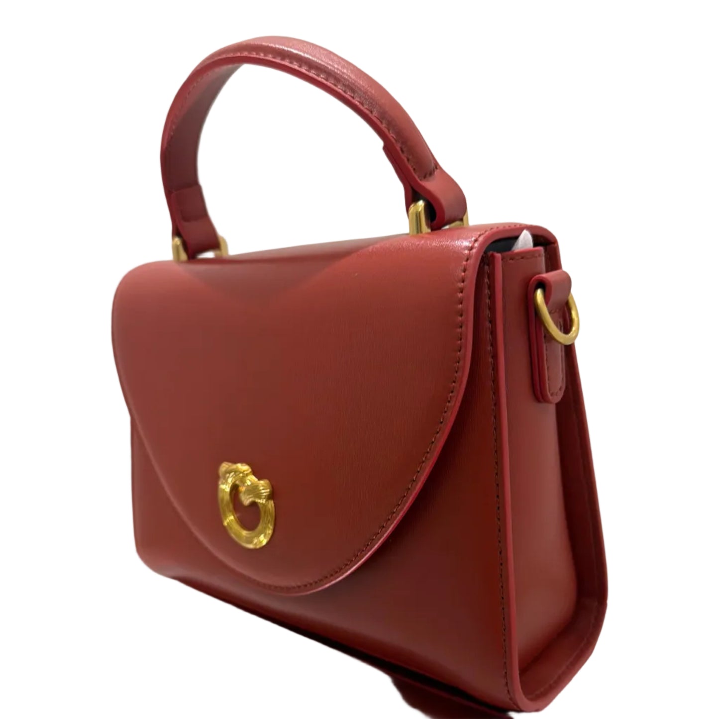 Brown handbag with gold accents on a white surface