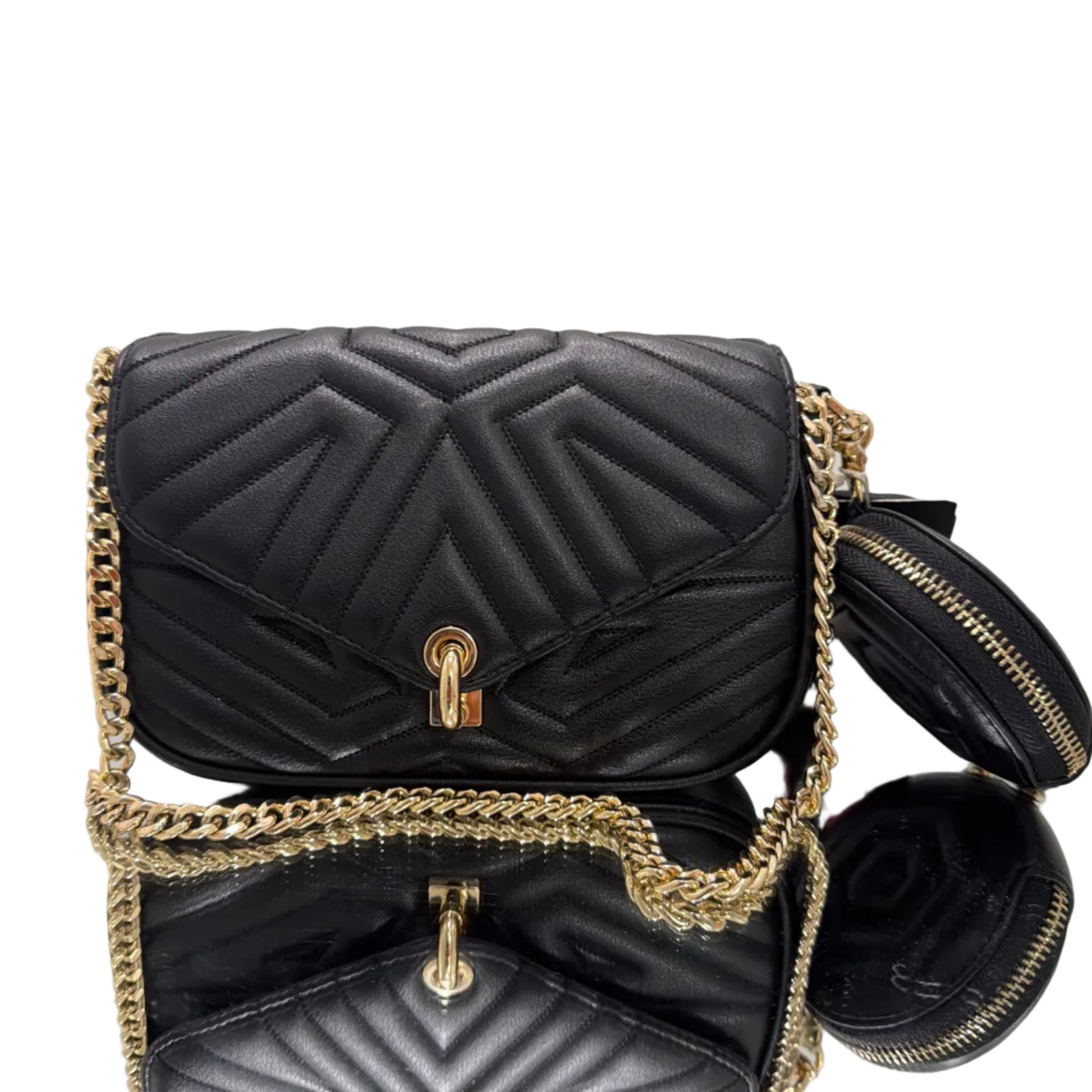 Black quilted handbag with gold chain detail on a light gray background