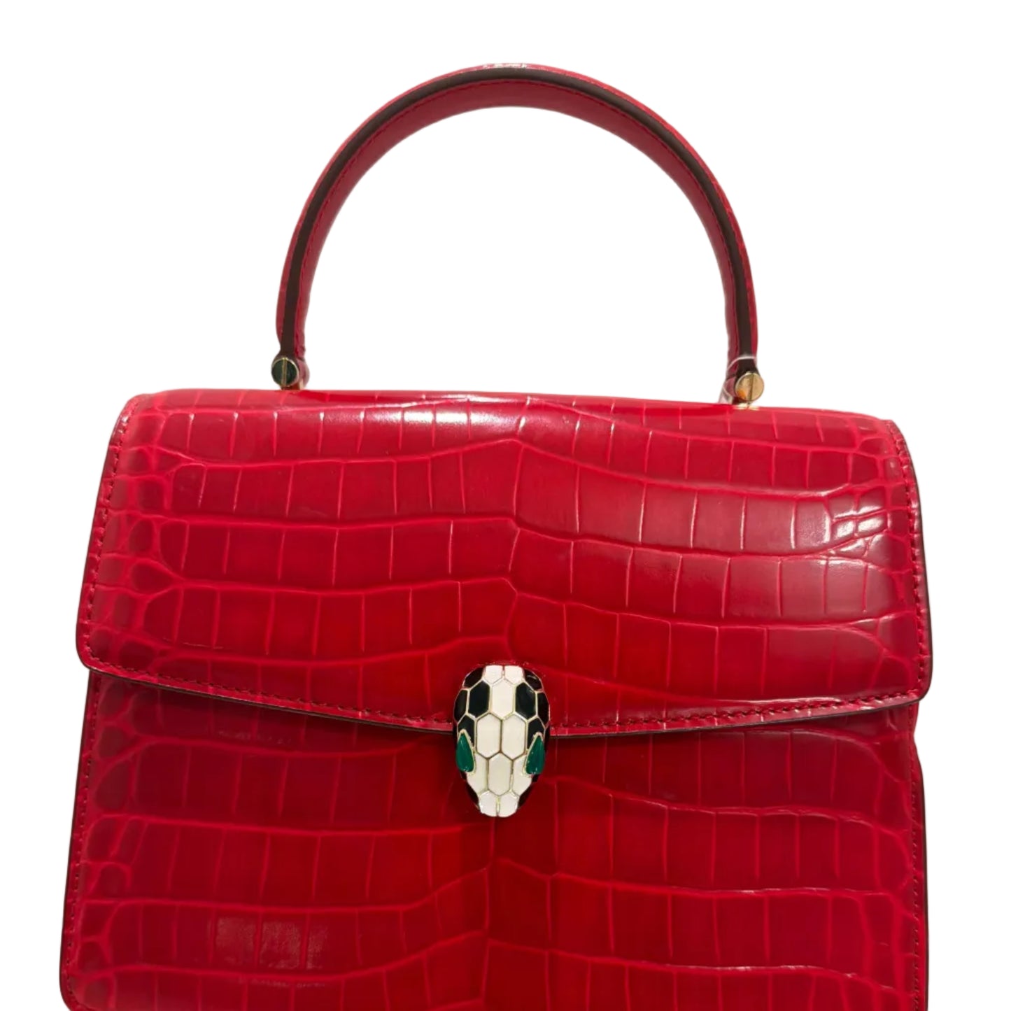 Red crocodile-patterned handbag with a metallic clasp on a light gray background