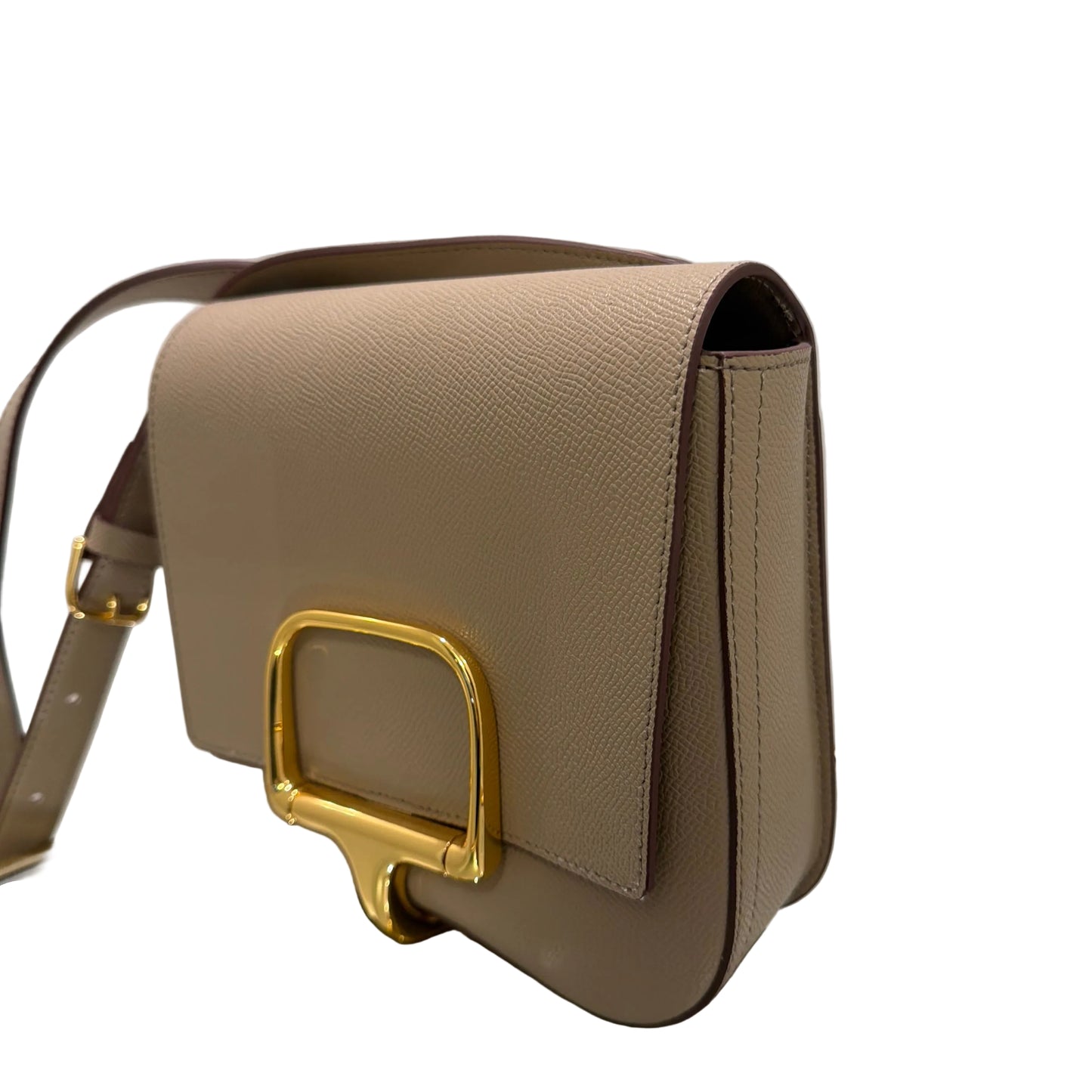 Beige handbag with gold clasp on a white background