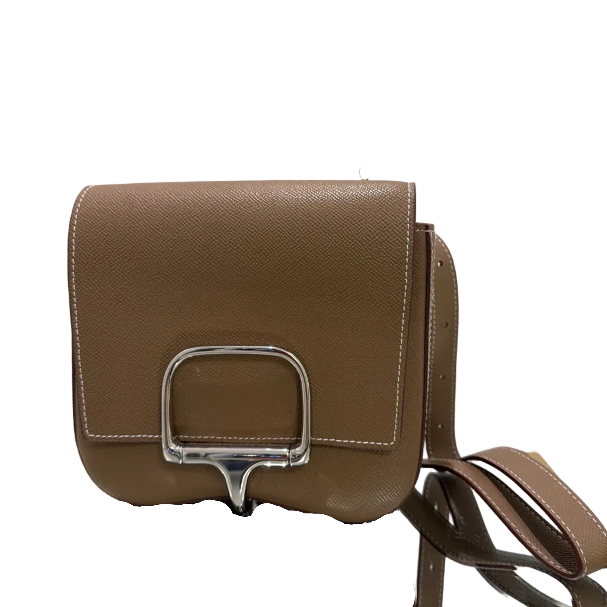 Brown handbag with silver buckle on a light gray background