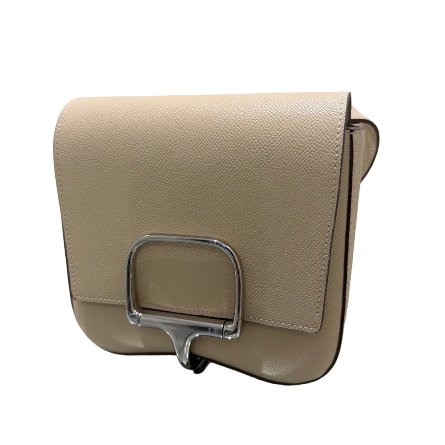 Beige handbag with a silver buckle on a white background