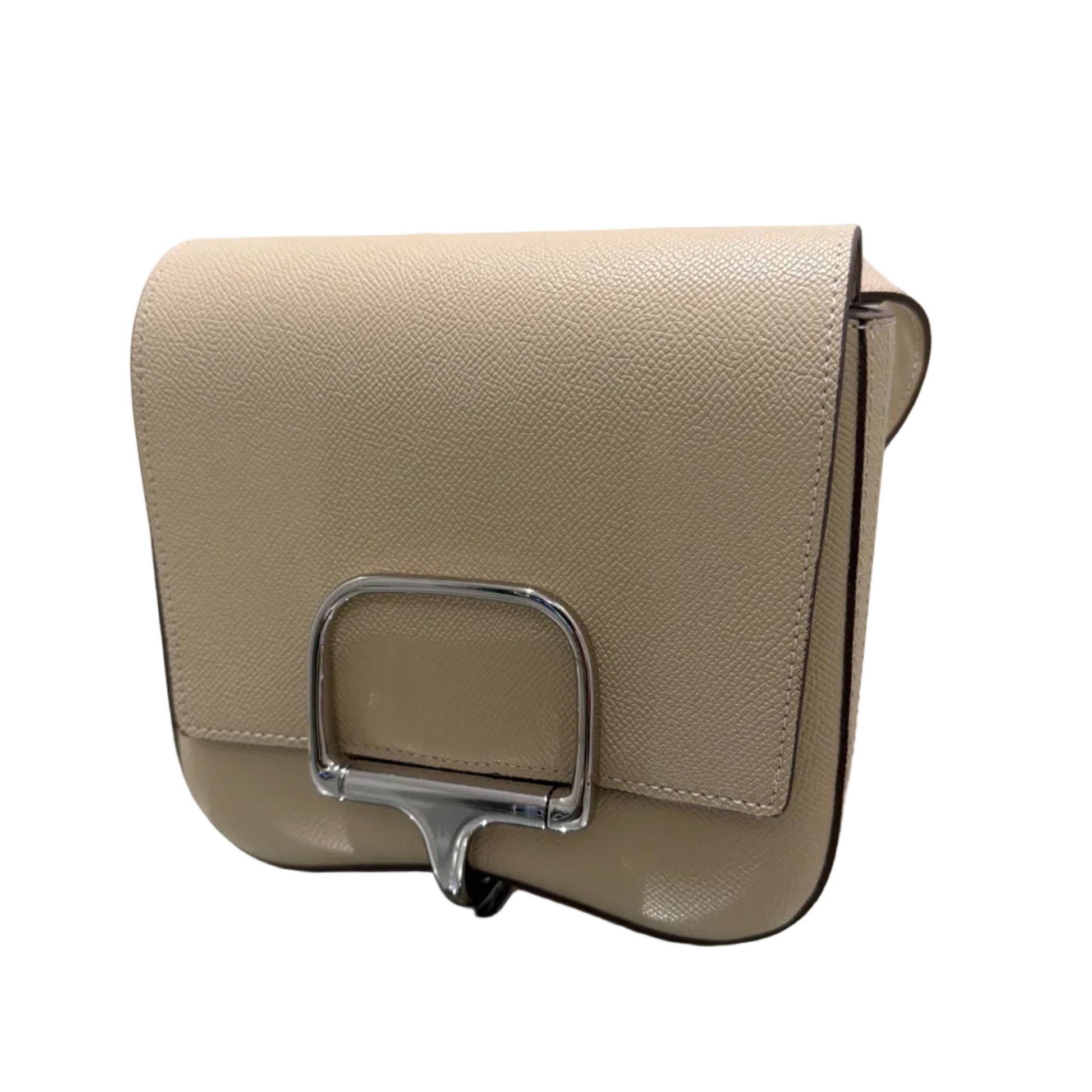 Beige handbag with a silver buckle on a white background